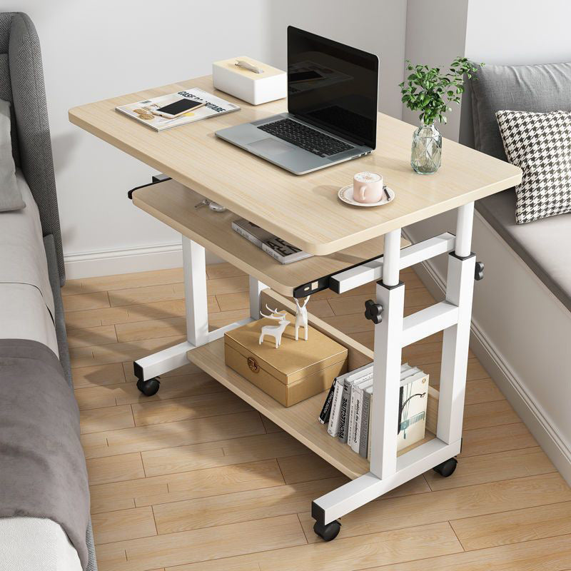 Adjustable ergonomic desk in home office setup with wheels for mobility, ideal for small spaces and co-working areas. Direct wholesale purchase advantage from Chinese manufacturer.