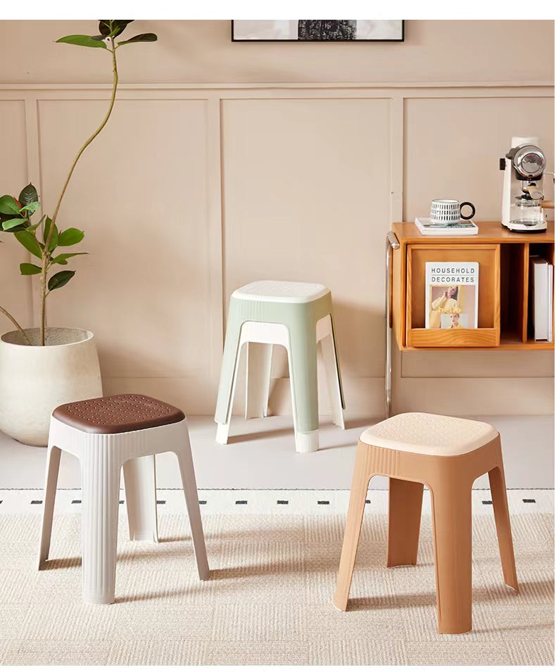 Stackable Nordic stools for home or office use, highlighting multifunctional design and easy mobility, ideal for living rooms, kitchens, and collaborative spaces. Perfect for bulk wholesale directly from China.