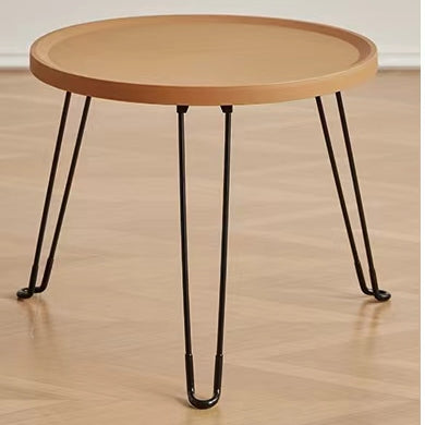 Round foldable coffee table with minimalist design, ideal for living rooms, lounges, and offices. Perfect for wholesale purchase directly from a Chinese manufacturer offering competitive pricing for bulk orders.