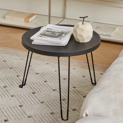 Round foldable coffee table for living room or office use, ideal for wholesale buyers from a Chinese furniture supplier.