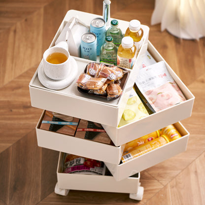 Movable multi-layer storage cabinet with rotating drawers holding snacks and beverages, ideal for flexible home or office use. Perfect for interior design projects and wholesale purchase direct from China.