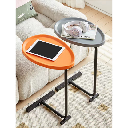 Two multi-functional side tables placed next to a sofa, holding a tablet, headphones, and books. Ideal for living room setups, home offices, or bedside use. Perfect for bulk orders and wholesale directly from a Chinese manufacturer.