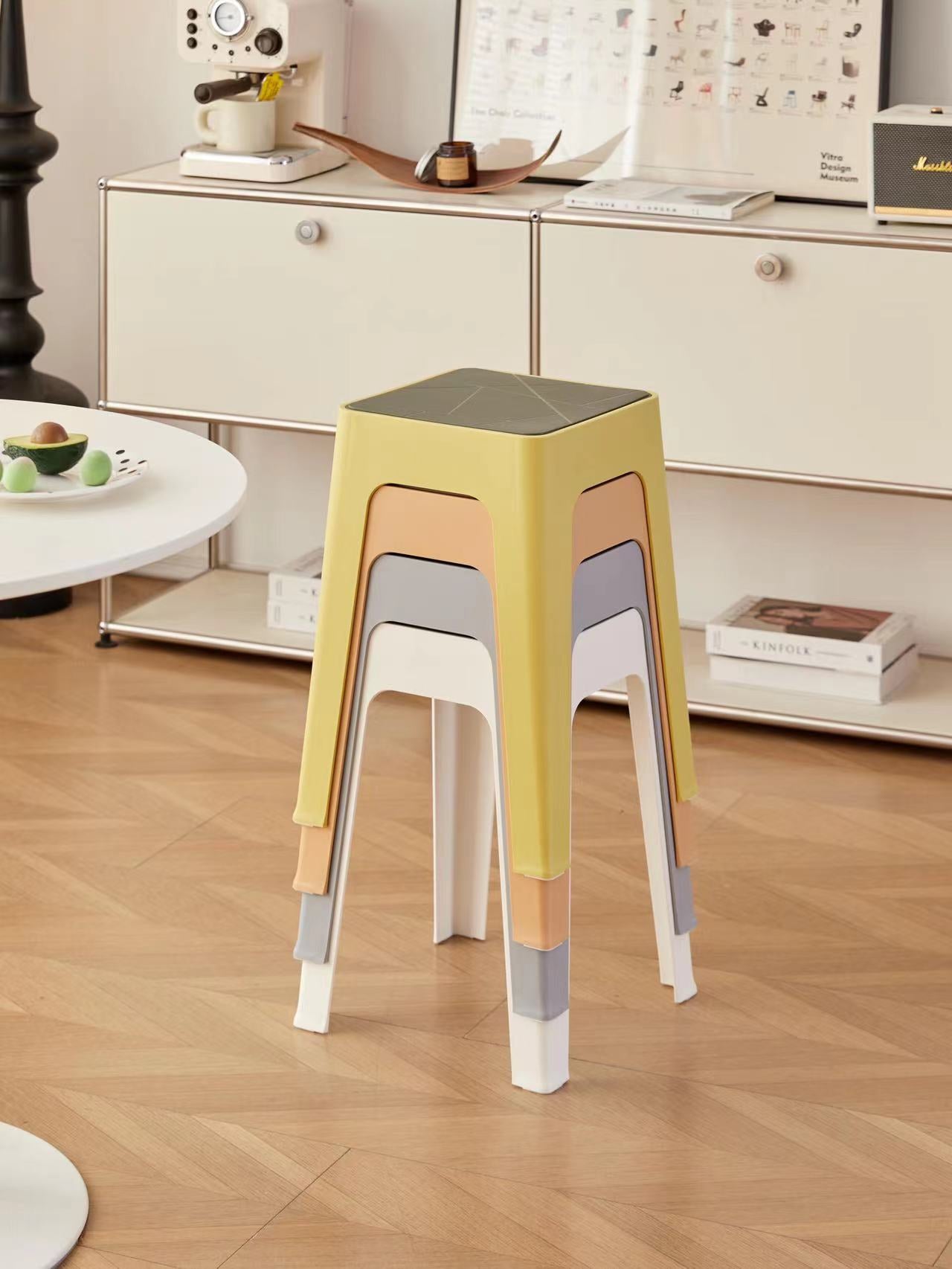 Stackable stools for space-saving seating in living rooms, bedrooms, offices, and commercial spaces; ideal for bulk orders directly from a Chinese manufacturer.