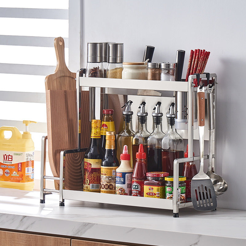 Multifunctional kitchen spice rack with condiments, utensils, cutting boards, and oil bottles organized neatly on a countertop, ideal for both home and commercial kitchen settings. Perfect for wholesale buyers looking for efficient, space-saving solutions from Chinese manufacturers.