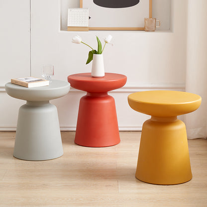 Multipurpose side tables in modern living room setup with decorative items, ideal for lounges, cafes, and public spaces; available for direct wholesale from a Chinese manufacturer.