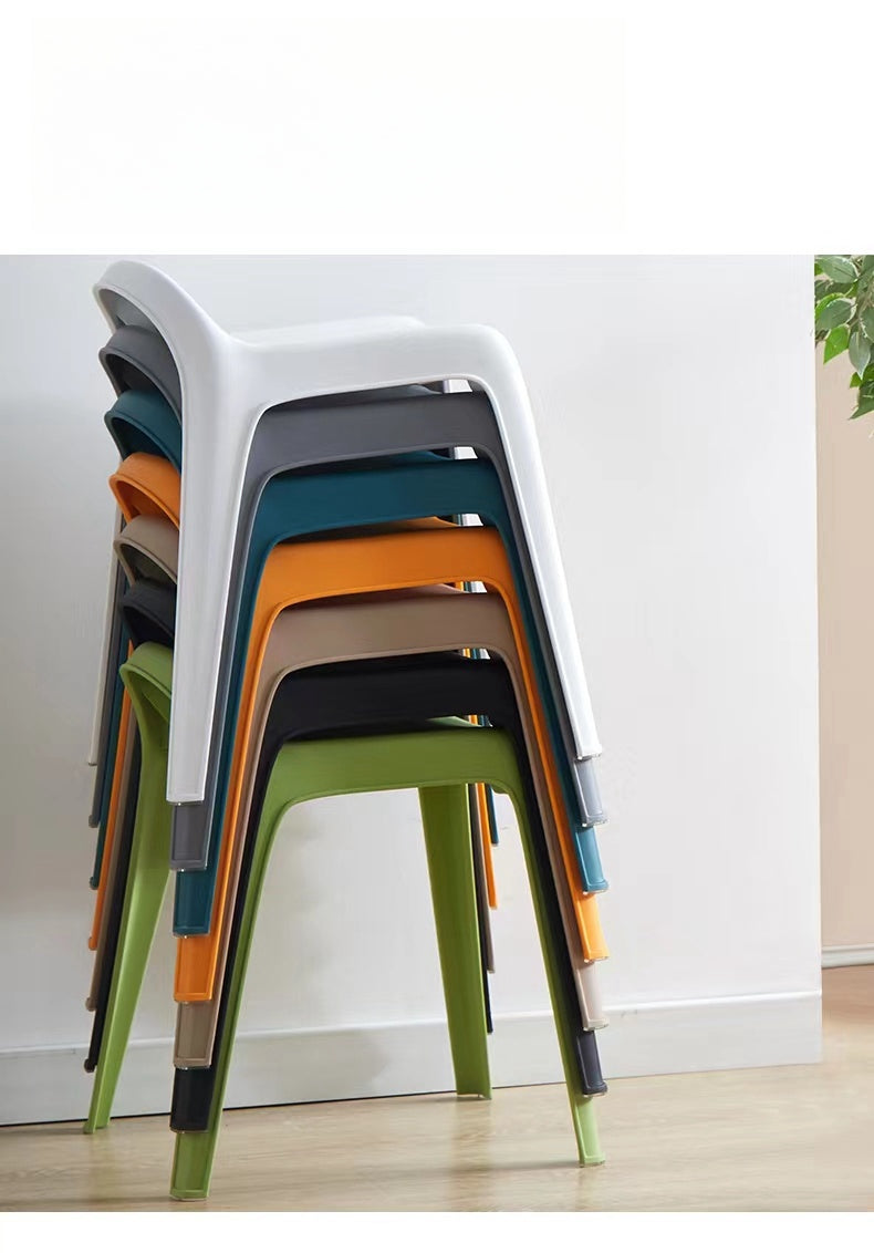 Stackable modern minimalist dining chairs, ideal for space-saving in cafes, restaurants, offices, and homes. Offered for wholesale with direct sourcing from China.