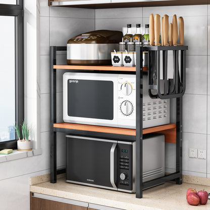 Multi-functional kitchen shelving unit holding microwave ovens, rice cookers, condiments, and utensils, ideal for home or commercial kitchens. Suitable for bulk wholesale from China.