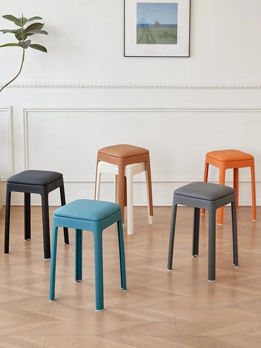 Stackable stools for offices, cafes, and dining areas; suitable for bulk sourcing directly from China. Featuring leather and mesh options, offering space-saving and versatile seating solutions for high-turnover environments.