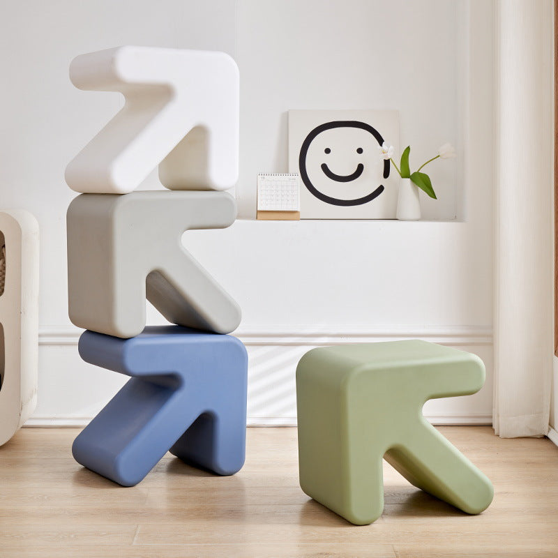 Stackable multi-functional stools arranged creatively, ideal for modern interior spaces. Perfect for bulk purchase from China for residential or commercial projects. Can serve as chairs, side tables, or decorative pieces in various environments.