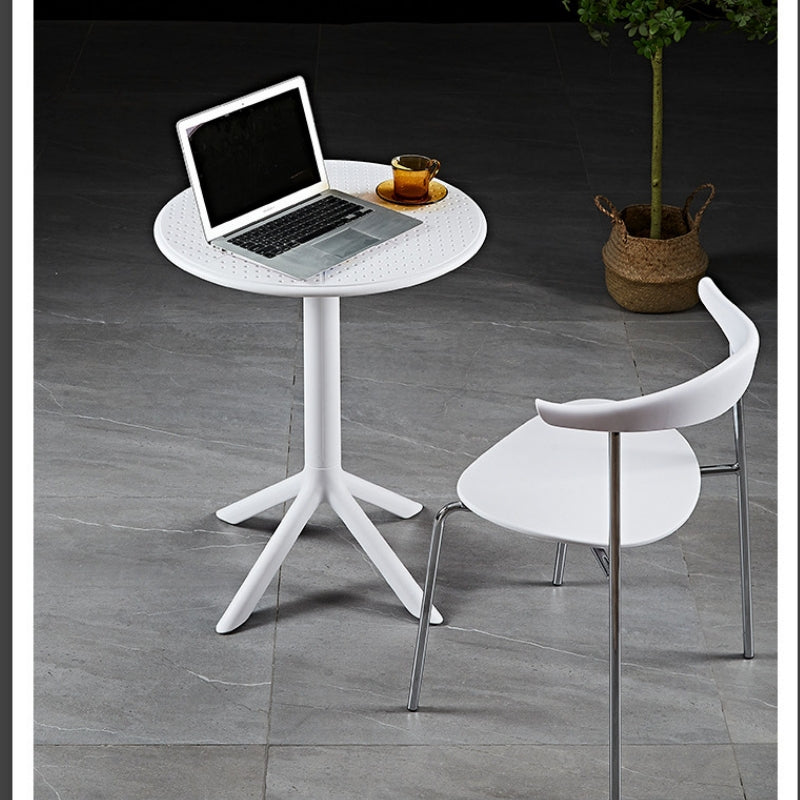 Modern bistro table with sleek design and matching chair, ideal for café and office spaces, perfect for wholesale buyers seeking direct sourcing from a Chinese manufacturer.