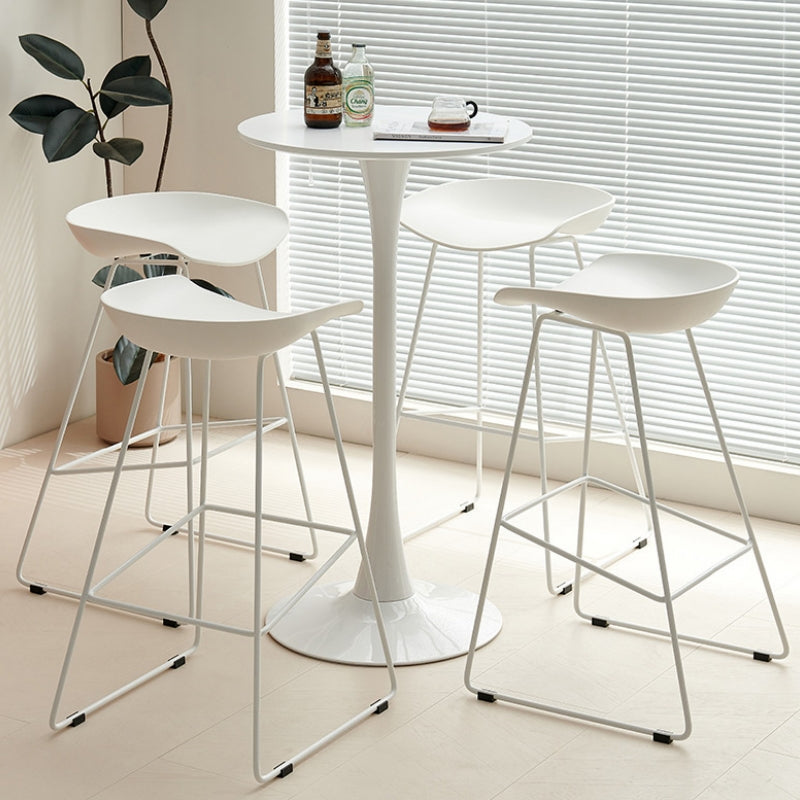 Modern bar table set with sleek stools and leather chair, ideal for café, lounge, restaurant, or home bar settings. Wholesale directly from China. Perfect for flexible, stylish arrangements.