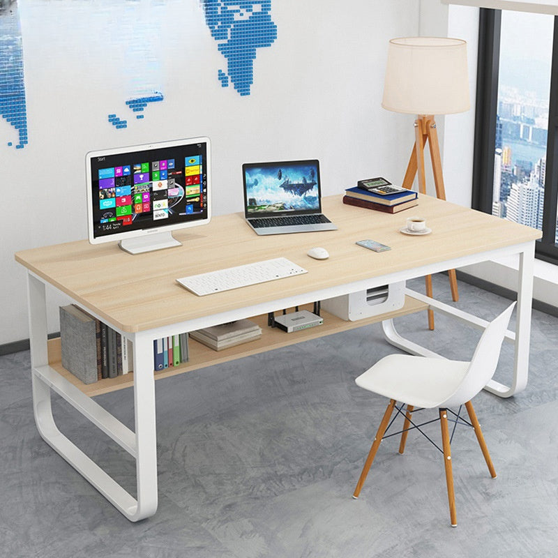 Modern work desk with spacious workspace and under-desk storage shelf, ideal for commercial offices, home offices, and co-working spaces. Sleek design available for bulk orders directly from China. Featured alongside ergonomic seating options, including leather chair.