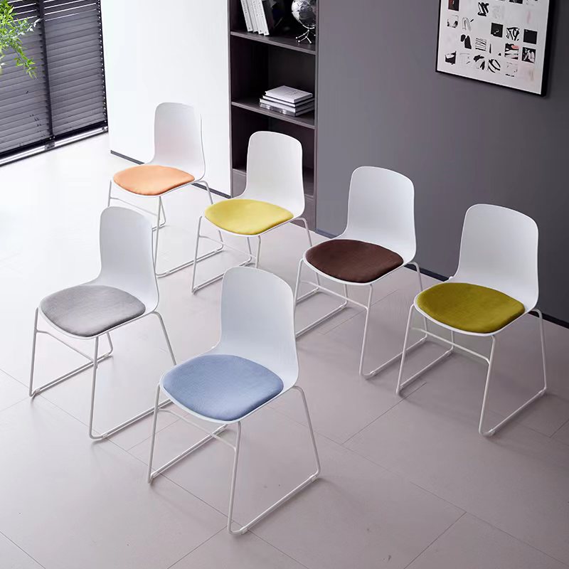 Stackable dining and café chairs with cushioned seats, perfect for commercial venues and home projects. Ideal for bulk orders directly from a Chinese supplier.