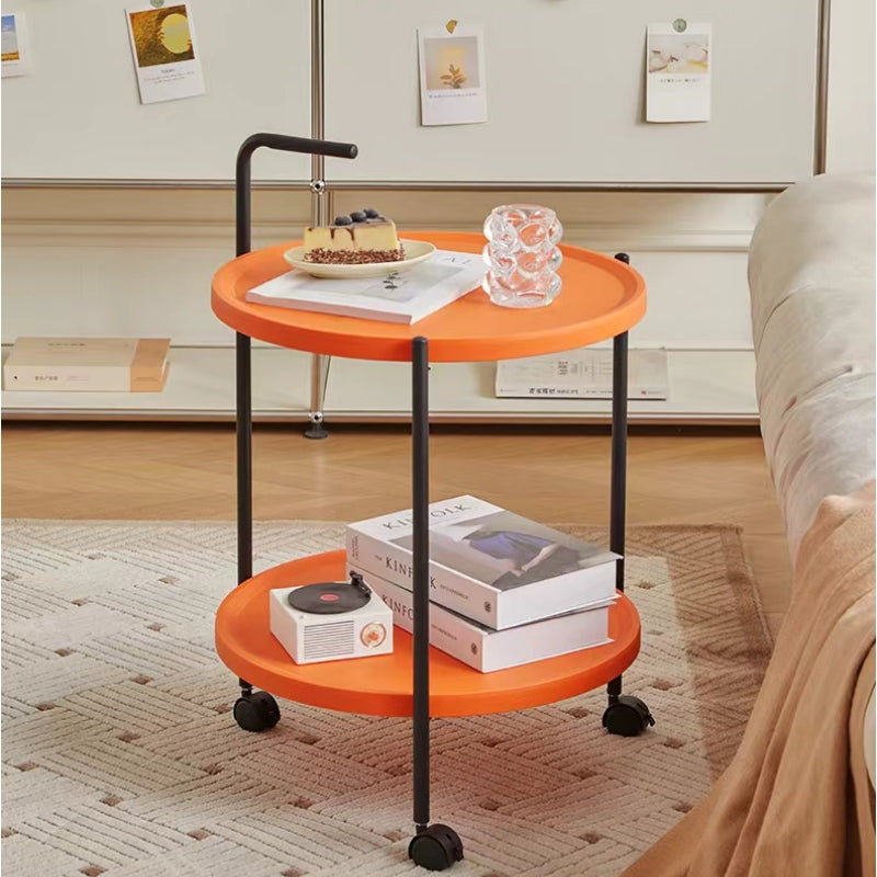 Modern two-tier mobile coffee table with wheels, perfect for living rooms, offices, and cafes. Ideal for flexible use in various settings, from home to commercial spaces. Wholesale availability directly from China.