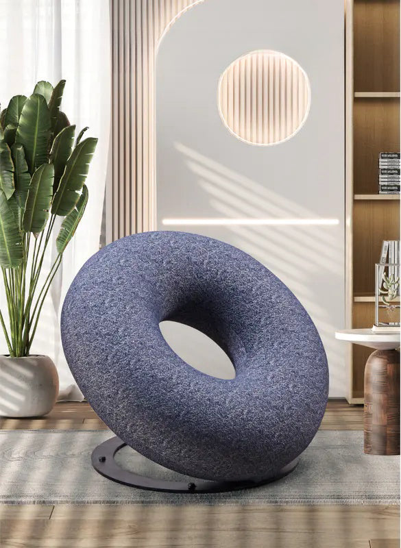 Modern donut-shaped lounge chair, ideal for contemporary living spaces, lobbies, and creative commercial interiors, available for wholesale from a Chinese manufacturer.