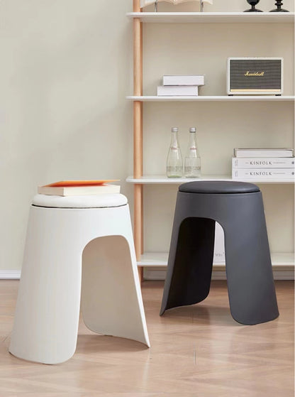 Stackable stools in a modern indoor setting, ideal for home, office, or commercial spaces, available for direct wholesale from China.