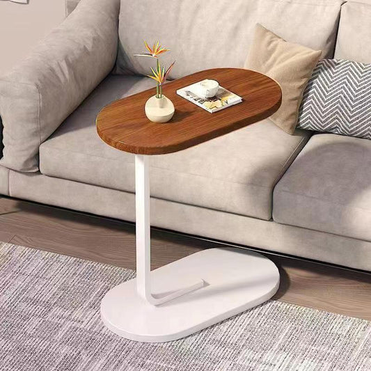 Multi-functional side table positioned by a sofa, ideal for living rooms, lounges, and home offices; perfect for wholesale import from China.