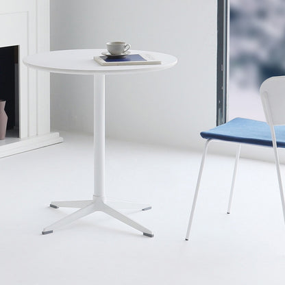 Round dining table with a minimalist design, ideal for cafes, bistros, and home setups. Accompanied by chairs, perfect for projects and bulk orders directly from China for commercial use.