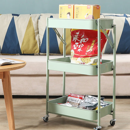 Mobile storage cart with three tiers for organizing office supplies, kitchen items, or personal accessories. Foldable design on wheels for easy mobility, ideal for home and business spaces. Suitable for wholesale purchases directly from China.