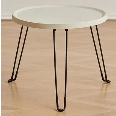 Round foldable coffee table with minimalist design, ideal for living rooms, offices, or lounges. Available for direct wholesale from a leading Chinese furniture supplier.