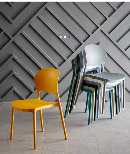 Stackable modern dining chairs suitable for cafes, dining rooms, and office environments, available for bulk wholesale directly from a China-based manufacturer.