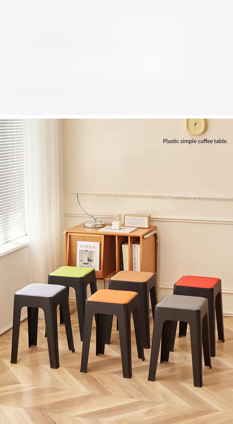 Stackable stools in a living room setting, ideal for cafes, offices, and homes, promoting space efficiency and offering direct wholesale options from Chinese manufacturers.