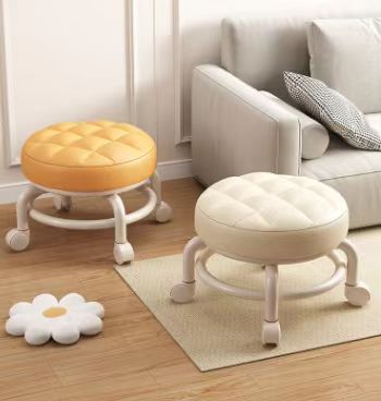 Upholstered stools with caster wheels, suitable for living rooms, offices, and commercial spaces. Ideal for wholesale buyers looking to source furniture directly from China.