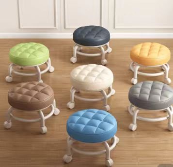 Upholstered stools with caster wheels, ideal for living rooms, offices, cafes, and commercial spaces. Perfect for bulk orders from a Chinese manufacturer.