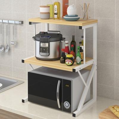 Kitchen countertop organizer with two tiers, holding a microwave, pressure cooker, and bottles, ideal for maximizing space in kitchens or home offices. Perfect for bulk purchases from a direct Chinese supplier.