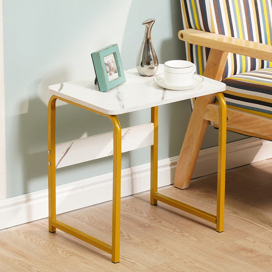 Small side table next to a striped armchair, holding a frame, teapot, and cup, ideal for living rooms or coffee spaces. Wholesale available directly from a Chinese supplier.