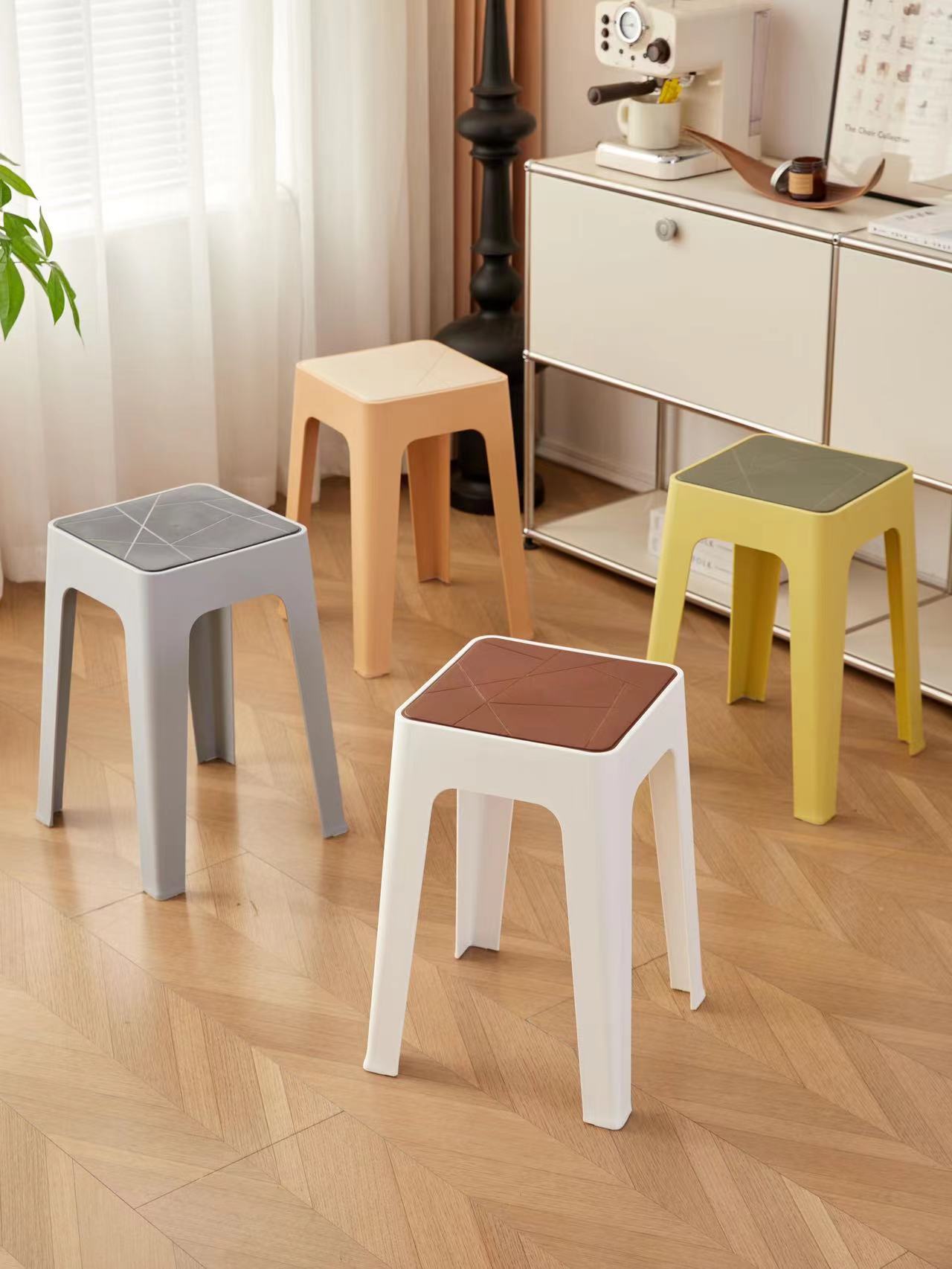 Stackable stools for home and office seating, customizable for bulk orders from a Chinese manufacturer, ideal for space-saving and organized environments.