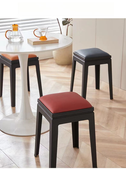 Stackable stools with cushioned seats, ideal for dining rooms, kitchen islands, cafes, and commercial spaces. Perfect for bulk buyers looking to source wholesale furniture directly from China. Customizable options available.