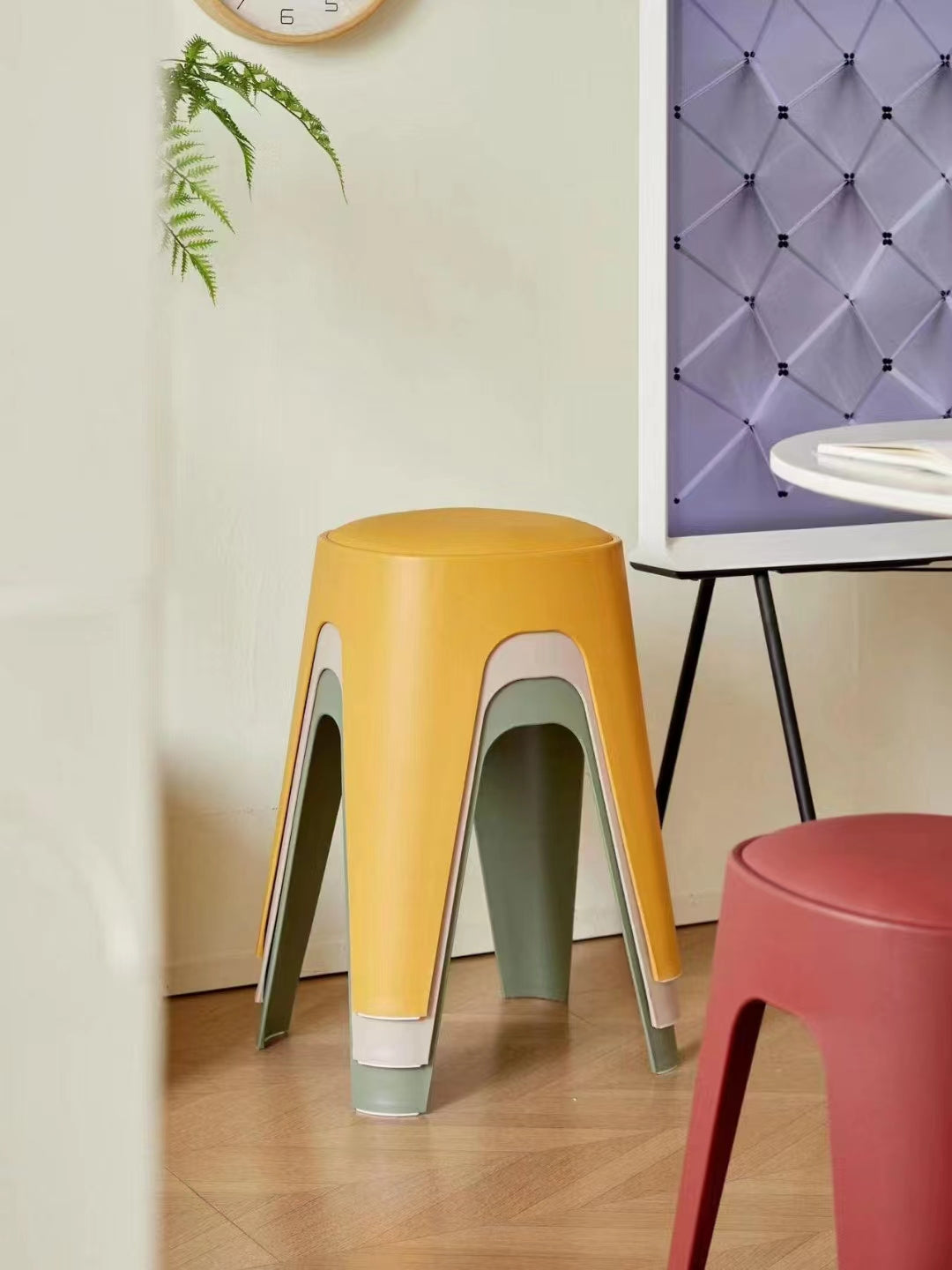 Stackable stools for space-saving solutions in homes, cafes, and offices, ideal for wholesale furniture buyers directly sourcing from China.