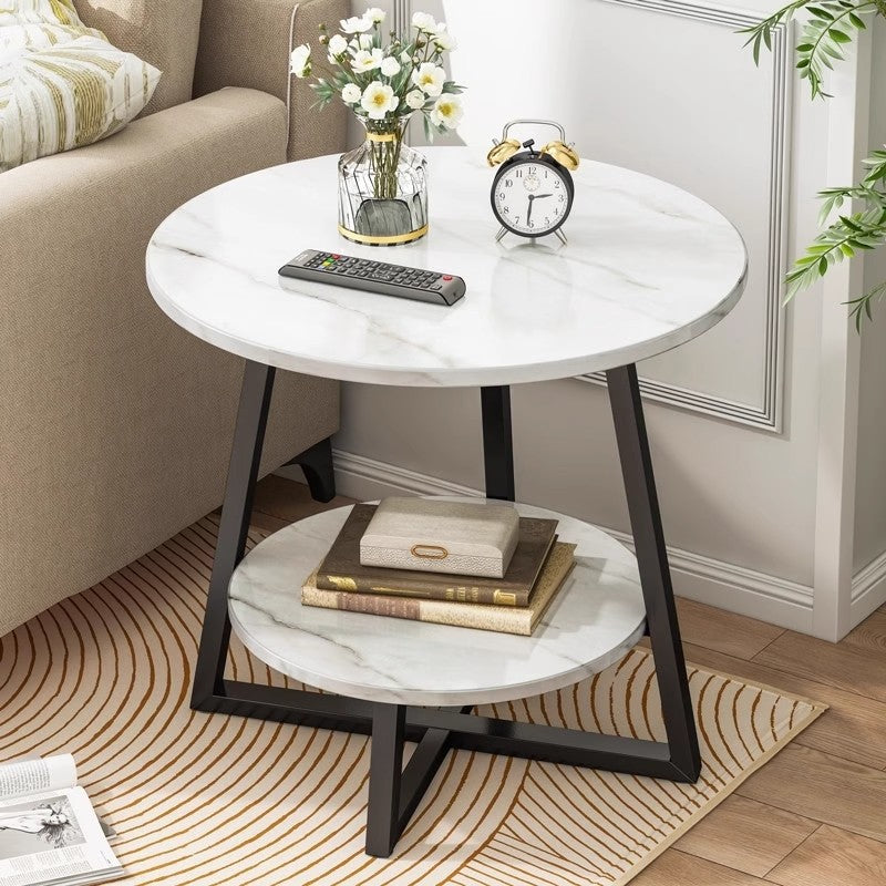 Modern round end table with storage shelf in a living room setting, showcasing a sleek design ideal for living spaces or offices. Directly available for wholesale from a Chinese manufacturer.