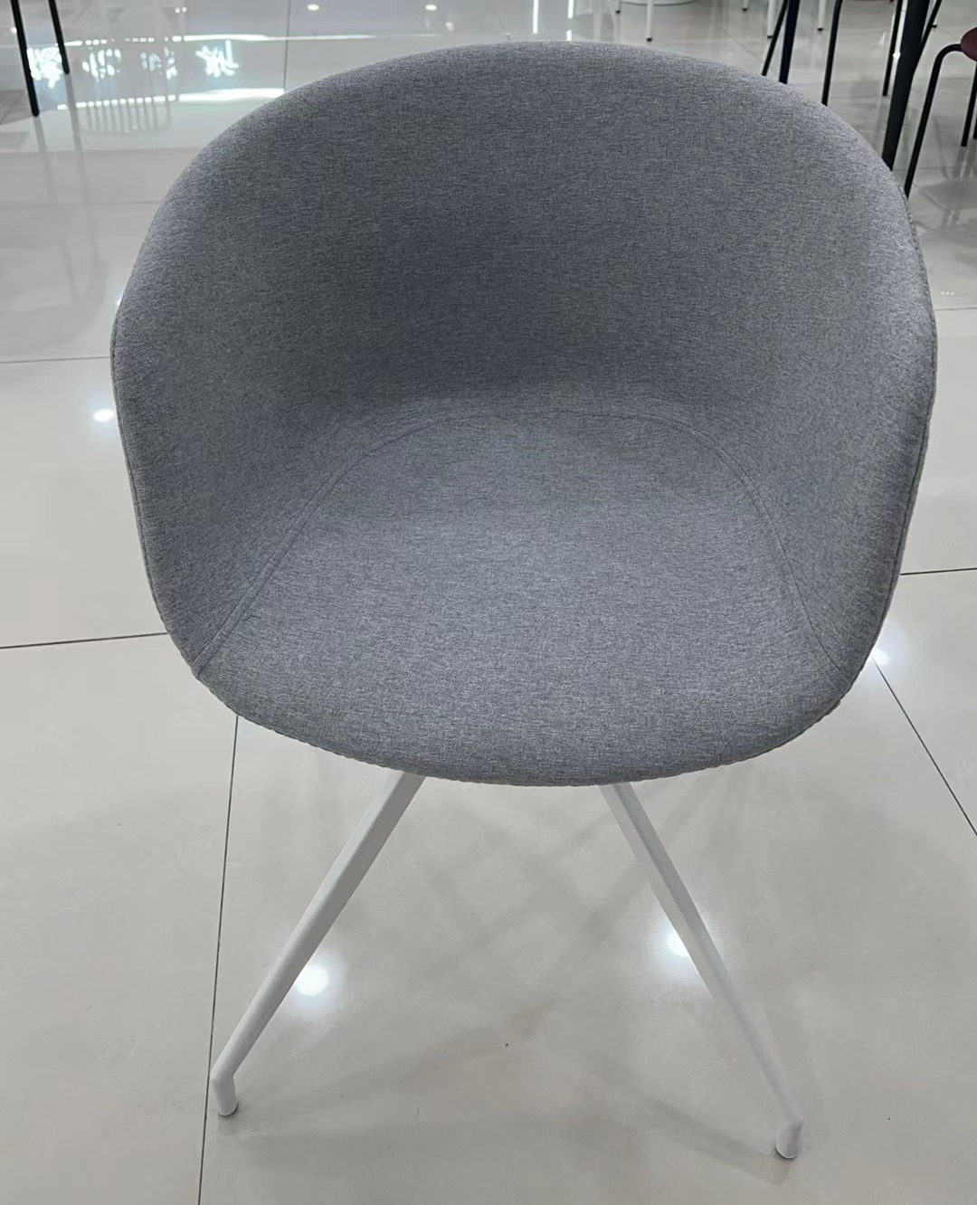 Ergonomic lounge chair suitable for office, dining, and living spaces, perfect for bulk purchasing from Chinese manufacturers at wholesale prices.