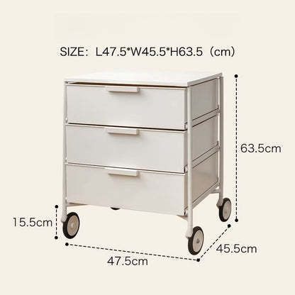 Mobile storage cabinet with three drawers on rolling wheels, ideal for office, bedside, or living room use. Wholesale directly from China. Suitable for flexible room arrangements.